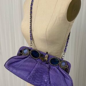 Purple snakeskin handbag with gem and beading detail